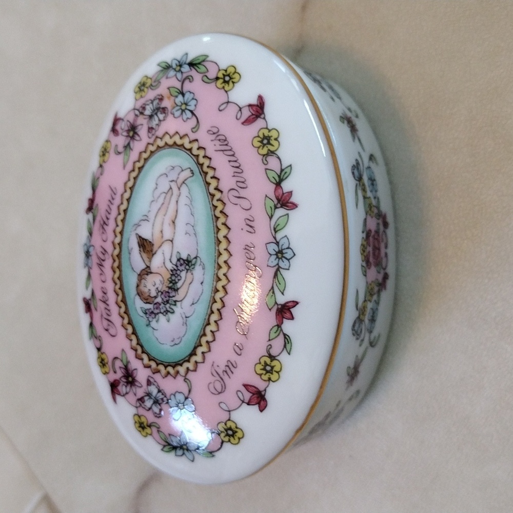 Beautiful vintage porcelain music box.